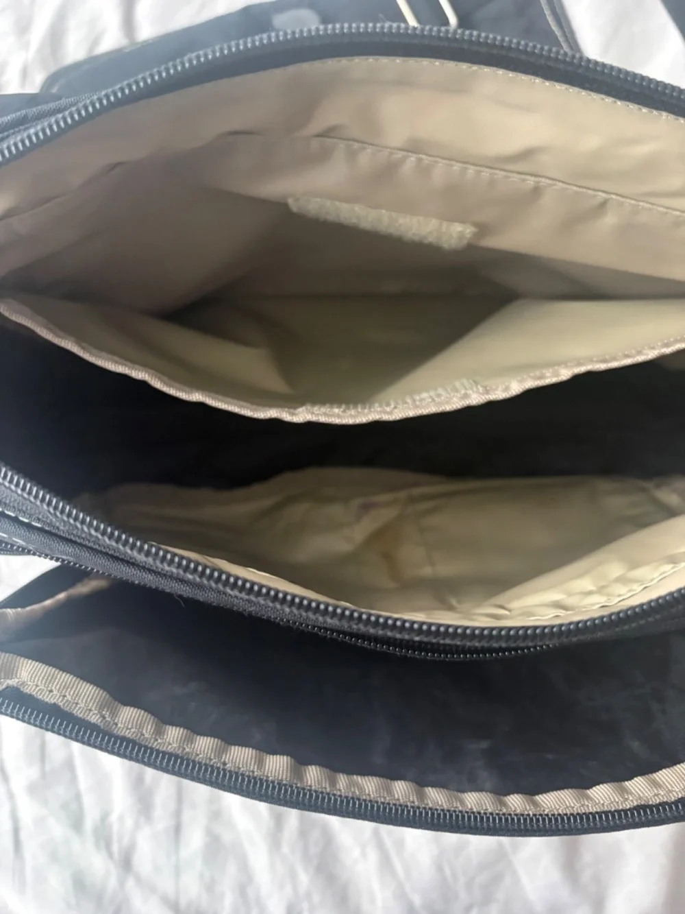 Inside NY unisex messenger bag.